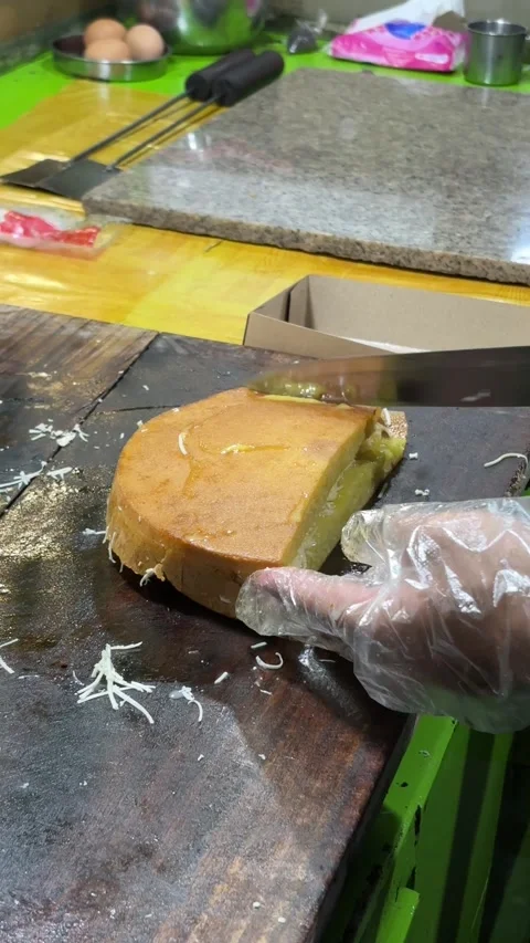 Preparing Bread and Cheese for Food Service in Kitchen Workspace Stock Footage 337563302