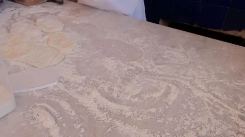 Preparing the bread of  Bafra style Turkish pizza aka pide by hand Stock Footage 242944709