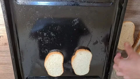 Preparing the bread for the bruschetta Stock Footage 160674917