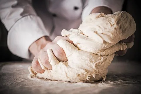 Preparing Bread Dough by Caucasian Kitchen Chef Stock Photos