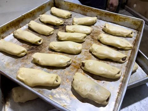 Preparing Bread Dough with Chocolate Filling Stock-Fotos