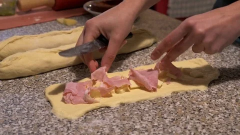 Preparing bread stuffed with ham and cheese Stock Footage 85313016