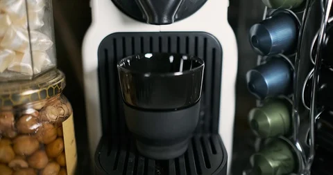 Preparing Breakfast Coffee with a Modern Coffee Machine Stockbeeldmateriaal 127967248