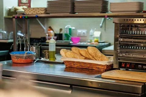Preparing breakfasts in the kitchen of a cafe Stock Photos