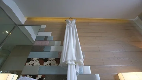 Preparing the bride for the wedding in hotel suite Stock Footage 94167062