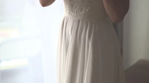 Preparing the bride for the wedding in hotel suite Stock Footage 94761900