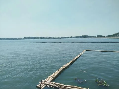 Preparing to build bamboo fish cages in the reservoir lake 스톡 사진