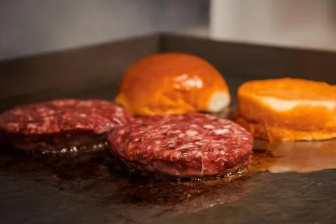 Preparing burger patties Stock Photos