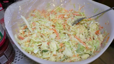 Preparing cabbage in the kitchen to prepare a salad Stock Footage 237201935