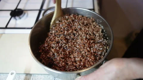 Preparing cake with chocolate and cereals Stock Footage 57467357
