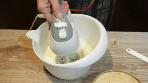 Preparing cake cream with mixer Stock Footage 58140981