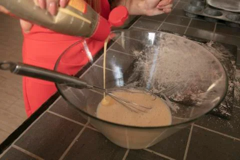 Preparing cakes for baking Stock Photos
