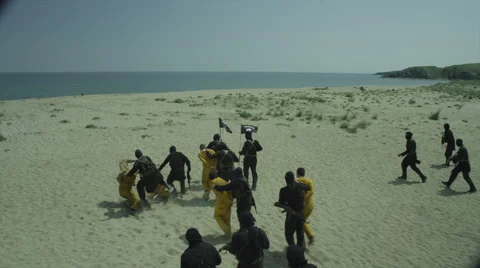Preparing for a Captives Execution on the Shore Stock Footage 59117783