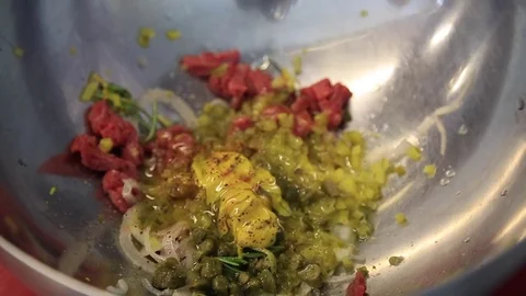Preparing Carpaccio with oil in the restaurant close-up Stock Footage 83587236