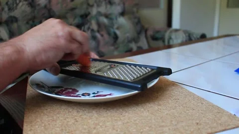 Preparing a carrot for cooking Video stock 317235978