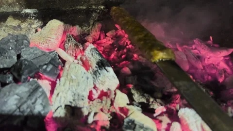 Preparing charcoal on the grill. The process of burning charcoal. Stock Footage 253823300