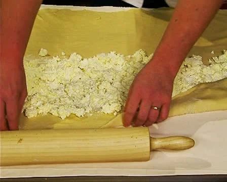 Preparing cheese pie Stockbeeldmateriaal 10717986