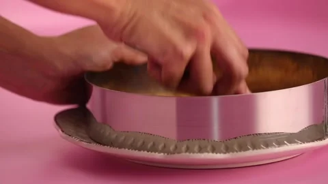 Preparing a cheesecake in a mold Stock Footage 133809263