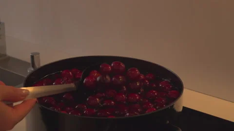 Preparing cherry compote Stock Footage 145777293