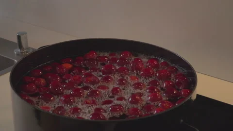 Preparing cherry compote Stock Footage 145779412
