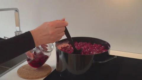 Preparing cherry compote Stock Footage 145783035