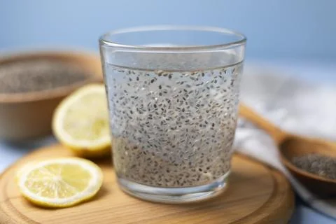 Preparing Chia Gel For Drinks. Suspended Chia Seeds In Water With Gel Formation Stock Photos