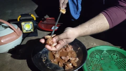 Preparing Chicken barbecue in a night 動画素材 230902479