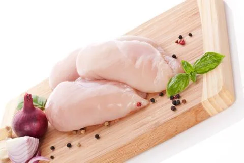 Preparing chicken breast. Stock Photos