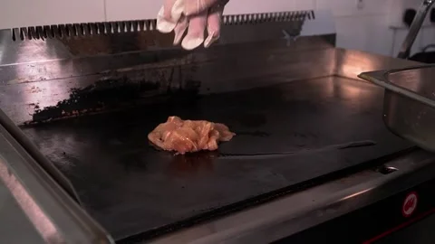 Preparing Chicken on a Grill Stock Footage 319949722