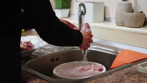 Preparing chicken legs for baking in a sauce in the kitchen Stock Footage 328904528
