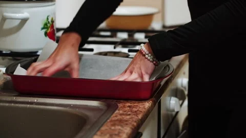 Preparing chicken legs for baking in a sauce in the kitchen Stock Footage 328904554