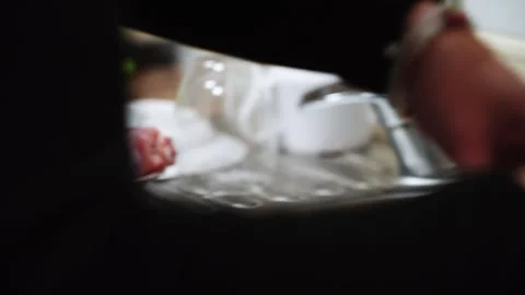 Preparing chicken legs for baking in a sauce in the kitchen Stock Footage 328904560