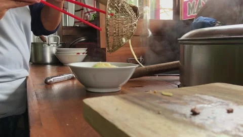 Preparing chicken noodles. Stock Footage 224869700