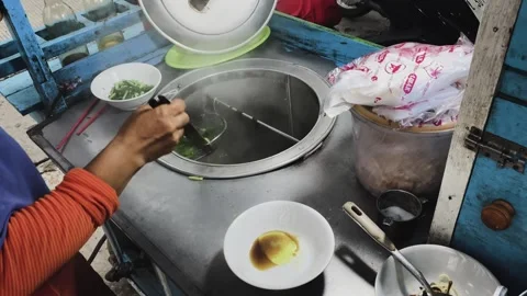 Preparing chicken noodles. Stock Footage 258314465