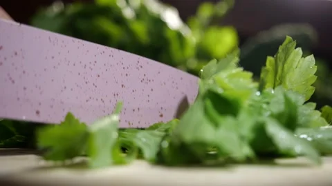 Preparing Chinese Celery for salad in 4k slow motion Stock Footage 141378717