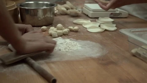 Preparing Chinese food by hand on table, cooking in Chinese kitchen. Video stock 266785930