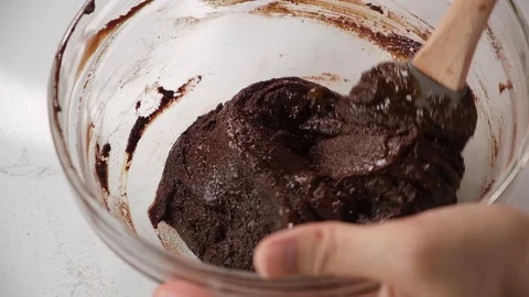 Preparing chocolate batter for cake and brownies. Stock Footage 123244387