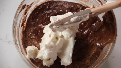 Preparing chocolate batter for cake and brownies. Stock Footage 124487688