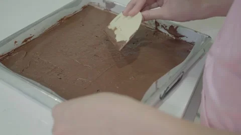 Preparing a Chocolate Dessert in a Baking Tray 库存影片 342281559