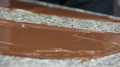 Preparing chocolate on a working surface Video stock 11404067