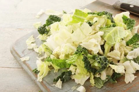 Preparing chopped savoy cabbage Stock Photos
