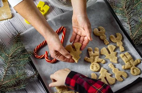 Preparing for christmas bake gingerbread cookie, woman hands hold christmas t Stock Photos