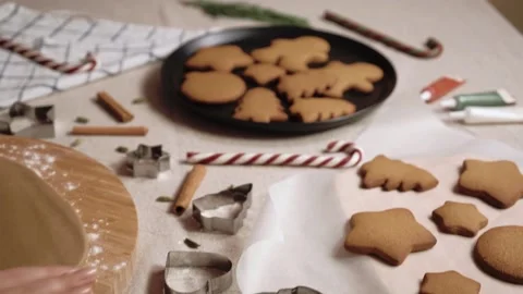 Preparing for Christmas. Camera shows a home table with traditional gingerbread Stock Footage 143711022