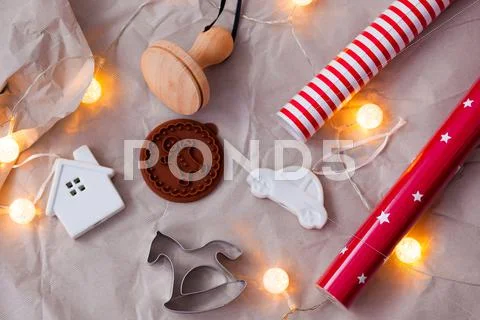 Preparing for Christmas. Kraft paper Christmas decorations, wrapping paper, bake Stock Photos