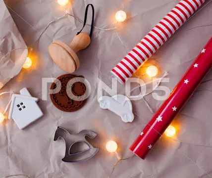 Preparing for Christmas. Kraft paper Christmas decorations, wrapping paper, bake Stock Photos