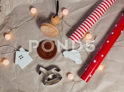 Preparing for Christmas. Kraft paper Christmas decorations, wrapping paper, bake Stock Photos
