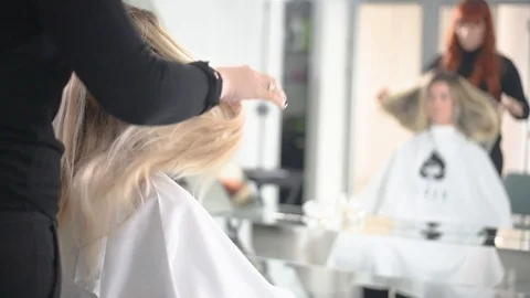 Preparing a client in salon Stock Footage 124852742