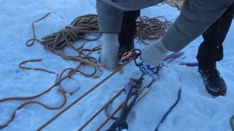 Preparing climbing equipment Stock Footage 83673241
