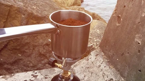 Preparing coffee on camping gas Stock Footage 91546014