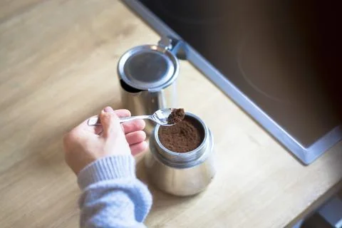Preparing coffee: Close up of coffee powder in a vintage coffee cooker Stock-Fotos